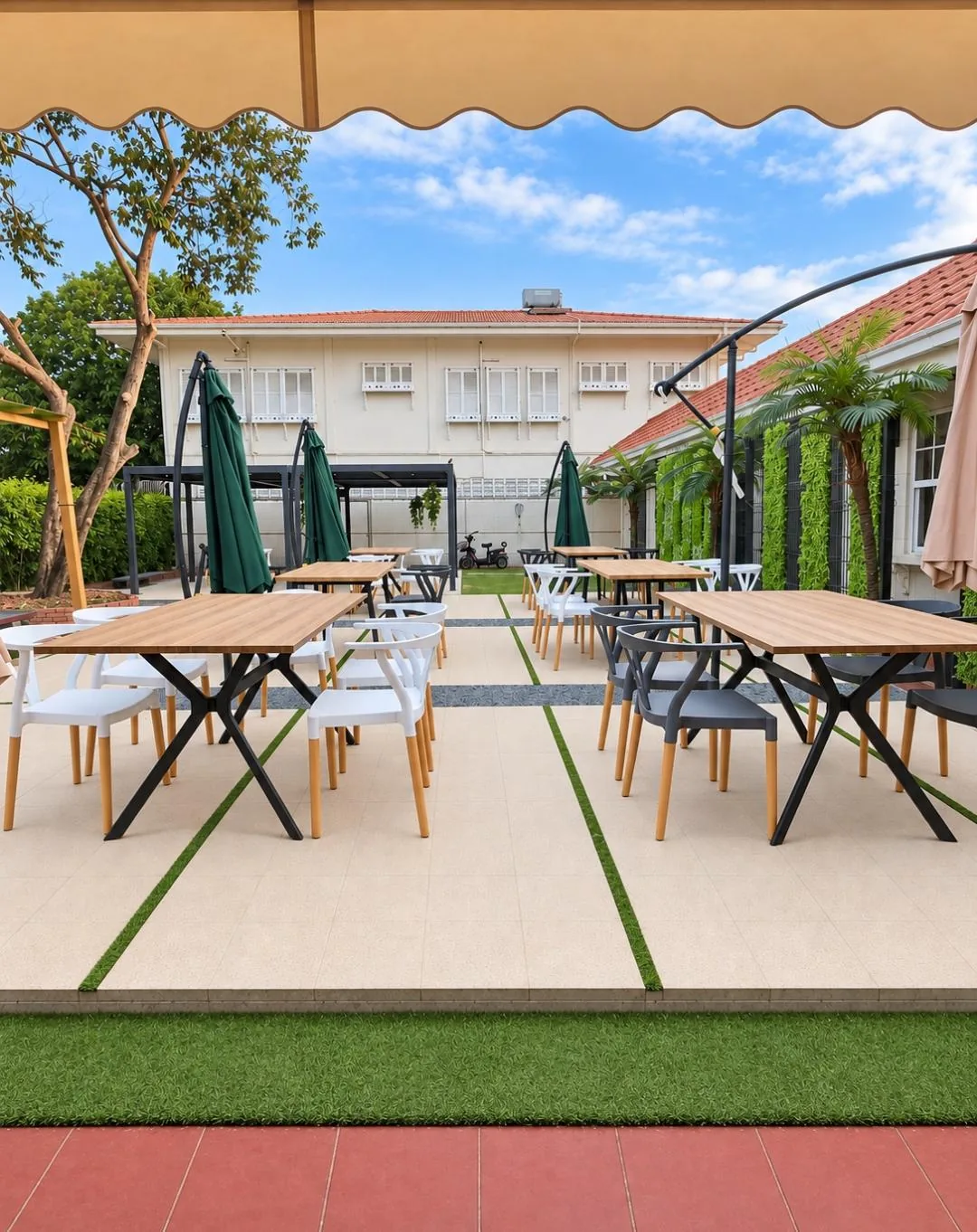 Tables and outdoor seating on The Patio’s deck