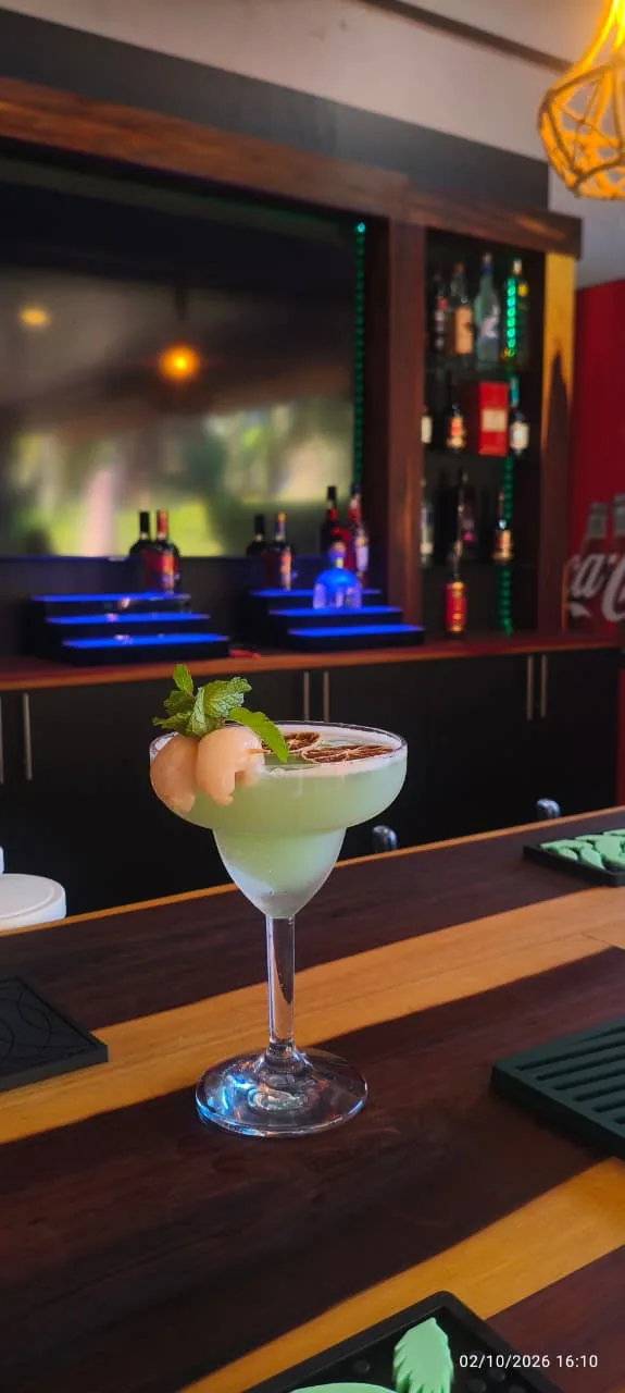 Lychee martini with a lychee garnish at The Patio’s bar