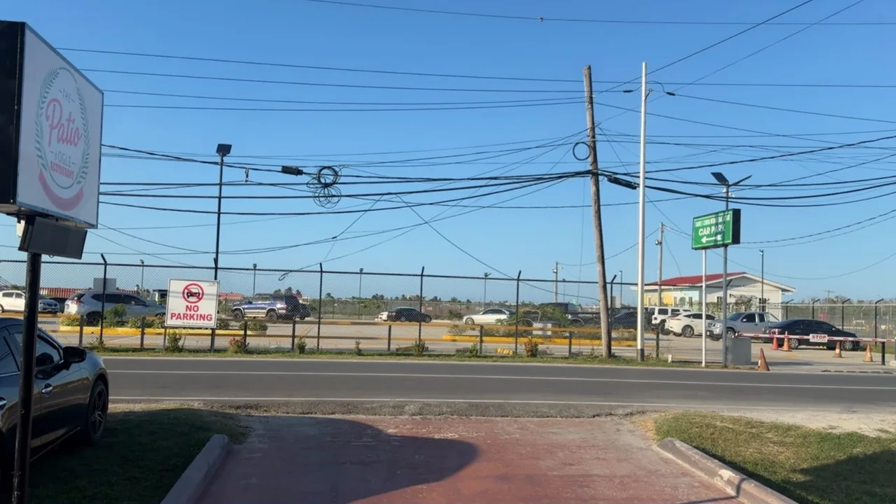 View toward the car park across Ogle Airport Road from The Patio